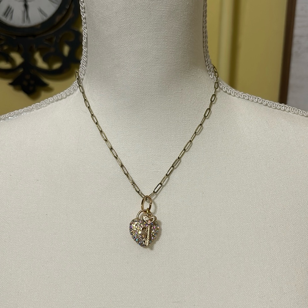 New 16” necklace with rhinestone heart & key pendant.  Nickel free.